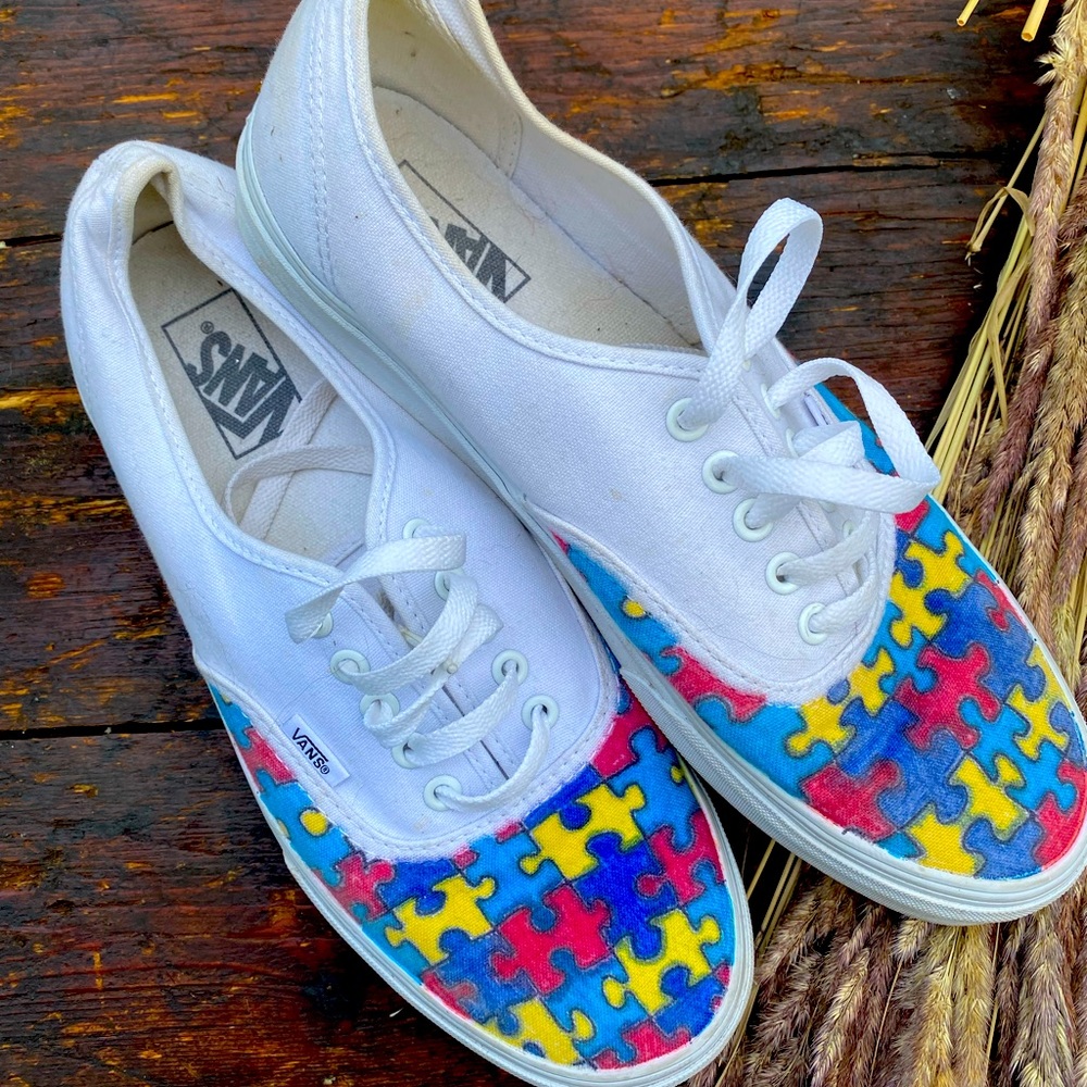 Size 12 customized Autism Awareness vans.